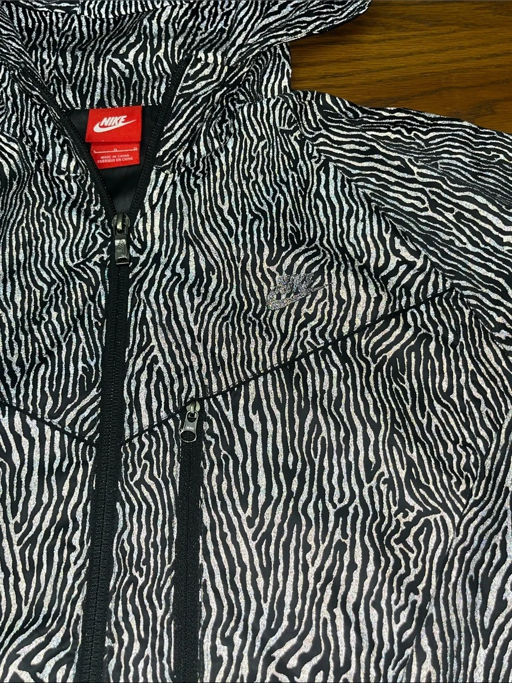 Nike Women’s Black with Gray Patterned Hooded Windbreaker Jacket